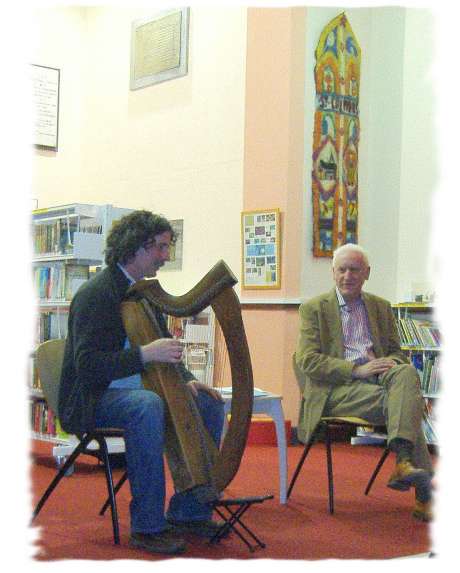 Click on image to see full-sized version Harper Paul Dooley with poet Pádraig Ó Moráin at Gort Library