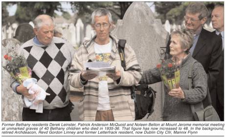 Click on image to see full-sized version Former Bethany residents Derek Leinster, Patrick Anderson McQuoid and Noleen Belton at Mount Jerome memorial meeting at unmarked graves of 40 Bethany children who died in 1935-36. That figure has now increased to 48. In the background, retired Archdeacon,