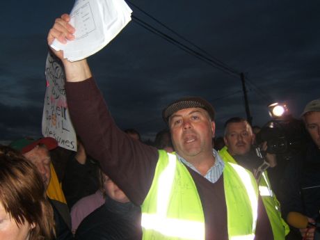 Click on image to see full-sized version Willie Corduff addresses the crowd and the police.