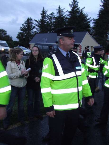 Click on image to see full-sized version Sgt. Dermot Butler MY28, Belmullet, pictured with two of the four Frontline observers.